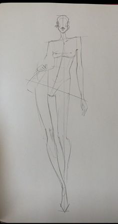 a pencil drawing of a female figure on a sheet of paper with lines drawn across it