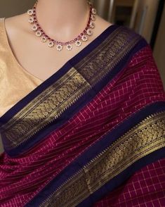 NEW ARRIVALS MAGENTA COLOR COTTON  SILK  SAREE WITH CHECKS AND BLUE/PURPLE PALLU WITH PURE GOLDEN ZARI BORDER D.NO KUM-44000 💗 MAGENTA COLOR COTTON SILK SAREE WITH  BLUE/PURPLE BORDER AND GOLDEN PURE ZARI BORDER COMES WITH CONTRAST  BLOUSE ✅ IN PHOTOGRAPHS BLOUSE ITS ONLY PURPOSE FOR MODELI   ✅ SAREE HEIGHT: 46 inches SAREE LENGTH: 5.5 meters + 80 cm blouse ✅ COMPLIMENTARY Fall and Edging Stitching (Pico): Saree comes with Complimentary Fall & Pico. No need to run around to get the Fall or Pico - NOTE . IF YOU NO NEED FALL STITCHING PLEASE INFORM US, ✅ We Regularly Update our Shop with New Listings and update our old listings daily. You can LIKE and FAVORITE our Shop to stay updated. Find more listings in my shop here: CARE: NORMAL WASH. ✅ More updates :- https://www.etsy.com/in-en/shop/K Exclusive Saree Blouse Designs, Purple Border, Saree Wearing Styles, Checks Saree, Indian Bridal Sarees, New Saree Designs, Cotton Silk Saree