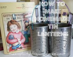 two tin canisters are sitting on a table with books in the background and text overlay how to make homemade tin lanterns