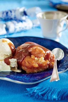 a blue plate topped with ice cream and dessert