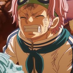 an anime character with pink hair and goggles on his head looking at the camera