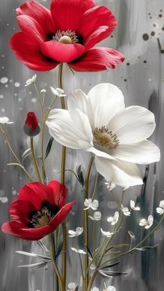 three red and white flowers in a vase