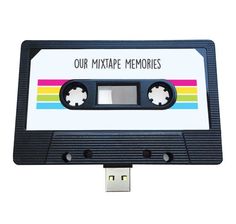 an old fashioned cassette tape usb drive with the words our mixture memories on it