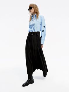 MO&Co. Women's Include Belt Maxi Skirt A transitional wardrobe staple, this maxi skirt is crafted from well-made fabric. The A-line silhouette is both elegant and flattering, while the side pockets and pleated details add functionality and flair. It's offered in classic black, the airy design is completed with a tonal belt for a touch of sophistication. Features : - High waist A-line maxi silhouette- Side slip pockets, pleated design- Belt loops and include the belted Code: MBD1SKT030The back le Workwear Asymmetrical Maxi Skirt With Pleats, Asymmetrical Pleated Maxi Skirt For Work, Asymmetrical Workwear Maxi Skirt With Pleats, Pleated Asymmetrical Maxi Skirt, Asymmetrical Pleated Maxi Skirt, Pleated Wide Leg Fall Maxi Skirt, Pleated Wide Leg Maxi Skirt For Fall, Relaxed Flared Maxi Skirt For Work, Pleated Wide-leg Fall Maxi Skirt