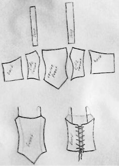 a drawing of different types of bras on a piece of paper with clothes hanging from them