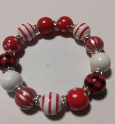 Elastic bracelet with a variety of red Christmas beads Christmas Beads, Christmas Bead, Christmas Bracelet, Elastic Bracelet, Red Christmas, Jewelry Bracelets, Beaded Bracelets, Elastic, Bracelet