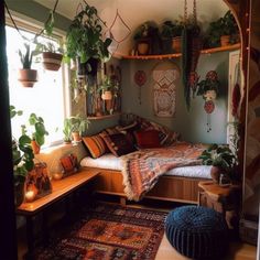 a bedroom with plants and rugs on the floor