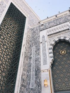 the entrance to an ornately designed building