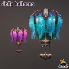 two colorful hot air balloons floating on top of a gray surface with the words jelly balloon above them