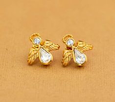 Vintage Angelic Wings Teardrop Rhinestones Stud Earrings by Avon Notes:  NA Features:  Brand: Avon Color: Gold Tone, Colorless Material: NA Size: Last image shows item with a ruler Yellow Gold Teardrop Clip-on Earrings For Gifts, Vintage Teardrop Clip-on Earrings As Gift, Luxury Yellow Gold Teardrop Clip-on Earrings, Vintage Gold Teardrop Clip-on Earrings, Vintage Silver Teardrop Clip-on Earrings, Angelic Wings, Heart Crown, Royal Queen, Elegant Red