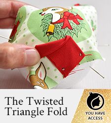 the twisted triangle fold is being sewn