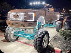 a large truck is on display at a show