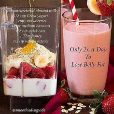 a smoothie and milkshake with strawberries on the side