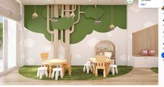 a child's playroom with green and white wallpaper, wooden table and chairs