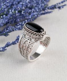 925 Sterling Silver Genuine Black Onyx Artisan Crafted Filigree Oval Cocktail Statement Ring Women Jewelry Gift Boxed for Her Material: 925 Solid Sterling Silver Authentic Genuine Black Onyx Gemstone Dimensions : 14 mm x 7 mm, Approximate Total Carat Weight: 3.4 Ring Face Length: 0.65 inches Ring Face width: 0.40 inches round This will come in a designer pouch & gift box with a romance card Free Domestic Shipping It is a gift that will create memories for years to come. Our fine silver jewel Onyx Silver Ring, Fine Silver Jewelry, Create Memories, Silver Jewels, Onyx Gemstone, Sterling Silver Filigree, Ring Women, Pillow Forms, Heart Locket