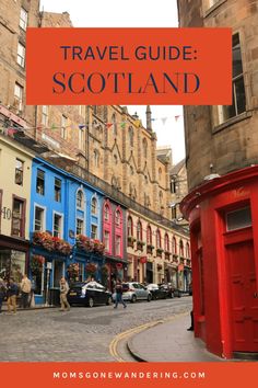 a red phone booth sitting on the side of a road next to tall buildings with text overlay that reads travel guide scotland