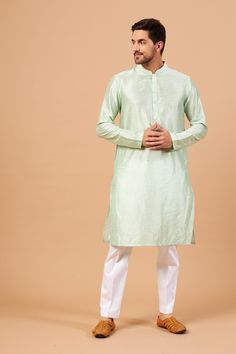 Pastel Green Plain Kurta With Crop Pants Hilo Design Presents Its Range Of Solid Kurta. This White Kurta Is Your Perfect Partner For A Traditional Event Or Ceremony. Pair This With White Crop Pants By Hilo Design To Complete The Look.Color :Pastel Green Fabric/Material :Falling Raw Silk &Amp; Cotton Lycra Sleeves :Full Sleeves Set Contains :Set Of 2 Wash Care :Cold Machine Wash Pastel Green Plain, Pastel Green Fabric, Plain Kurta, Pastel Green Color, Green Plain, White Crop Pants, White Kurta