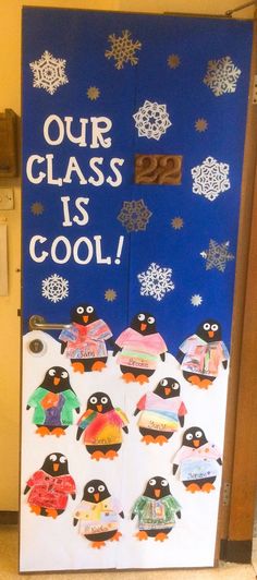 a bulletin board with penguins and snowflakes on it that says our class is cool