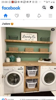 a washer and dryer in a room with shelves on the wall above them