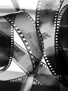 black and white photograph of film reels