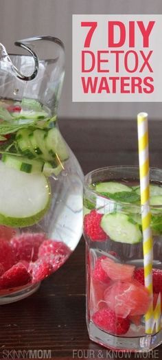 a pitcher filled with cucumbers, raspberries and watermelon slices