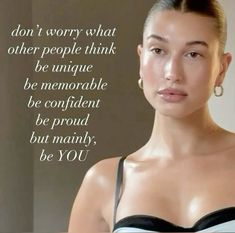 a woman in a black and white dress with a quote on her left side that says, don't worry what other people think be unique