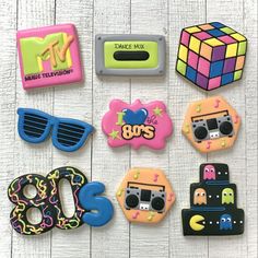 decorated cookies are arranged in the shape of an 80's and 90's