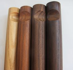 four wooden dowks lined up in a row