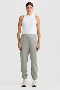 Comfort meets style with the Lena Track Pant Dusty Olive. Crafted from 100% mid weight Terry Cotton, these track pants are a must have addition to your athleisure collection. 100% Cotton French Terry Classic track pant with elasticated waist and design seam detailing Embroidered classic logo Elasticated cuffs Cutaway pockets Athleisure Ankle-length Joggers With Elastic Side Panels, Everyday Athleisure Bottoms With Straight Hem, Joggers With Elastic Side Panels In Solid Color, Athleisure Sweatpants With Ribbed Waistband, Sporty Joggers With Elastic Waistband, Basic Spring Joggers With Elastic Waistband, Sporty Bottoms With Elastic Cuffs And Straight Hem, Spring Athleisure Sweatpants With Ribbed Waistband, Athleisure Straight Joggers With Relaxed Fit