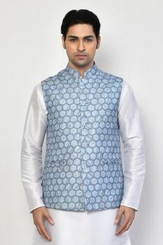 Blue sleeveless bundi with all over hexagon marble squish print. Paired with a white full sleeves plain kurta and a pant. - Aza Fashions Blue Tailored Long Sleeve Nehru Jacket, Elegant Single-breasted Nehru Jacket, Luxury Single-breasted Nehru Jacket, Fitted Single-breasted Long Sleeve Nehru Jacket, Marble Print, Fashion App, Full Sleeve, Aza Fashion, Cotton Blend