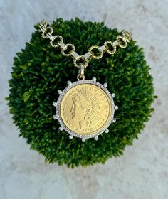 This is a beautiful statement coin necklace. The gold plated, double circle patterned chain is 16" with the large coin that is surrounded with crystals.  The coin is a replica or 1883 queen coin and measures about 2.5 inches/ A matching bracelet is also available. Bought as a set is a discount. Message me if interested. Coin Necklace Gold, Gold Coin Necklace, Necklace Chunky, Gold Coin, Matching Bracelet, Chunky Necklace, Circle Pattern, Coin Necklace, Matching Bracelets