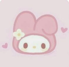 a pink hello kitty face with flowers on it's head and hearts in the background