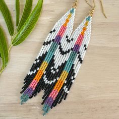 5.5 inches long including ear wire. Beaded Feather, Purple And Yellow, Diamond Bar, Fringe Earrings, Ear Wire, Pink Purple, White Black