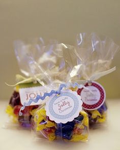 two bags filled with candy sitting on top of a table