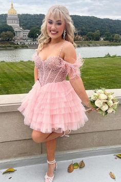 Be the life of the party in this beautiful Pink Beaded Cold-Shoulder Ruffle Tiered Short Formal Dress. Boasting a beaded bodice and feathered cold-shoulder sleeves, this dress will be sure to make a statement. The ruffle tiered skirt is sure to make you the star of the night. Make a lasting impression in this gorgeous dress!#shortformaldresses#schooleventdress#holidaydress#graduationdress#cocktaildress#winterformal#winterformaldress Prom Dresses Short Pink, Pink Prom Dresses Short, Off The Shoulder Homecoming Dress, 2024 Board, Sparkly Party Dress, Sparkly Party, Short Formal Dress, Wedding Dress Cap Sleeves, Beach Bridal Gown