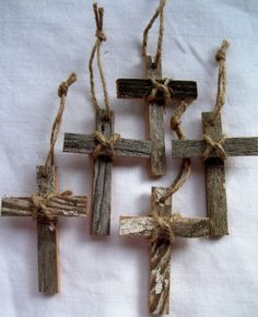 four wooden crosses tied together with twine