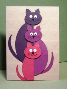 a card with two cats on top of each other