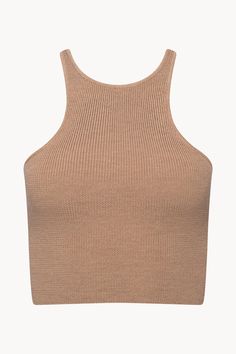 Cropped silhouette tank in merino wool with high crew neckline. Fitted Ribbed Merino Wool Top, Stretch Merino Wool Tops In Solid Colors, Stretch Merino Wool Solid Top, Stretch Merino Wool Solid Color Tops, High Neck Ribbed Knit Tank Top, Ribbed Knit High Neck Tank Top, Fine Knit High Neck Merino Wool Top, Fine Knit Merino Wool High Neck Top, Chic Beige Merino Wool Tops