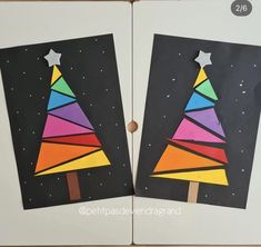 two colorful christmas trees cut out of paper