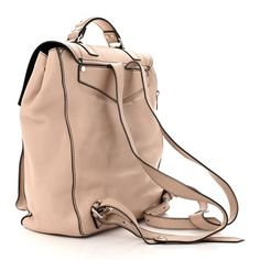 This is an authentic PROENZA SCHOULER Grained Calfskin PS1 Plus Backpack in Sand. This stylish satchel is crafted of calfskin leather in beige and features a leather strap top handle, an adjustable shoulder strap with silver links and a facing flap with silver switch lock. This opens to a spacious fabric interior with a zipper and patch pocket. Strap Top, Strap Tops, Proenza Schouler, Top Handle, Patch Pocket, Calf Skin, Leather Straps, Satchel, Shoulder Strap