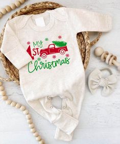 Personalized Baby Romper: Celebrate Your Baby's First Christmas in Style Your baby's My First Christmas Outfit should be memorable, and our Baby Romper is here to make it unforgettable. Personalized and designed for comfort, it's the mu... Baby Winter Romper, Christmas Baby Names, Baby Picture Outfits, Christmas Baby Romper, My First Christmas Outfit, First Christmas Outfit, Cute T Rex, Cute Onesies, Thoughtful Baby Shower Gifts