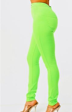 These sleek, skinny-fit pants offer both comfort and style with a high-rise waist and stretch fabric that accentuates your curves for a flattering silhouette. With round back pockets, these pants add both function and fashion to your everyday look. Skinny fit Stretchy Round back pockets Button closure Available in white, neon purple and neon green