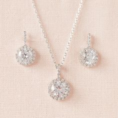 "I've created these dainty crystal earrings and pendant using dramatic halo settings. I use only high quality chains/materials. All my jewelry is nickel free. Total length of earring is just under 7/8\" Total length of pendant is 7/8\" Matching Reese jewelry: https://www.etsy.com/shop/CrystalCorridor?search_query=reese Matching Bracelet: https://www.etsy.com/listing/228800989/bridal-bracelet-crystal-wedding-bracelet https://www.etsy.com/listing/229229925/rose-gold-bridal-bracelet-crystal https:/ Bridal Necklace Gold, Bridal Earrings Silver, Gold Wedding Earrings, Gold Bridal Necklace, Necklace Emerald, Gold Earrings Wedding, Crystal Bridal Earrings, Bridal Bracelet, Pearl Charms