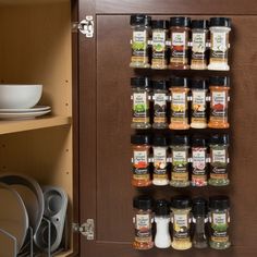 a spice rack with many different spices on it