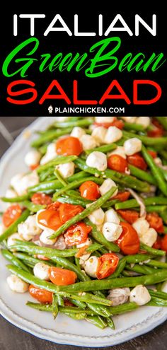 green bean salad with tomatoes and mozzarella on a white plate