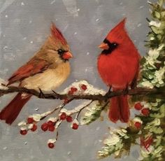 two birds sitting on a branch with berries