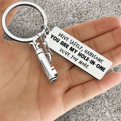 What is the best golf gift idea for your Boyfriend/Future Husband/Husband for his Birthday, Anniversary, Valentine, Christmas, Graduation, Thanksgiving, etc? There might be no better gift than this special Golf Charm Keychain? This keychain/ keyring features a cool design for golf lovers. It's pocket-size, great companion for bags, keychains, or backpacks. It will be with him side by side, whenever he needs so he can feel your your care and follow up.It also comes in a box with a meaningful love Golf Birthday Gifts For Boyfriend, Golf Themed Birthday Party For Men, Goodie Basket, Golf Birthday Gifts, One Month Anniversary, Golf Ball Gift, Boyfriend Ideas, Drive Safely, Anniversary Boyfriend