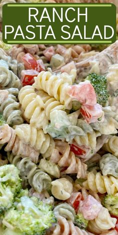 pasta salad with broccoli and tomatoes in a bowl