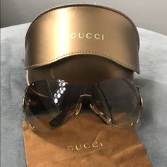 Authentic Gucci Sunglasses. It’s In Great Condition But The Case Has A Few Scratches On It Due To Usage. Gucci Designer Shield Sunglasses With Uv Protection, Designer Gucci Shield Sunglasses With Mirrored Lenses, Designer Shield Sunglasses With Uv Protection For Formal Wear, Designer Shield Sunglasses With Uv Protection For Formal Occasions, Designer Shield Sunglasses With Uv Protection For Formal Events, Elegant Gucci Shield Sunglasses With Uv Protection, Gucci Elegant Shield Sunglasses With Gradient Lenses, Elegant Gucci Shield Sunglasses With Tinted Lenses, Elegant Gucci Shield Sunglasses With Gradient Lenses