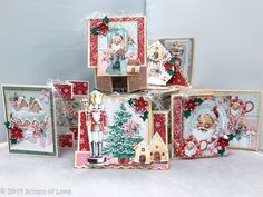 a group of christmas cards sitting on top of a table